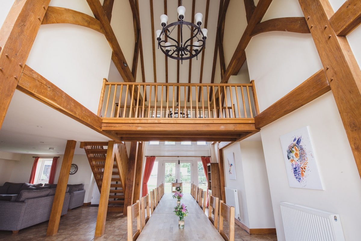 Beautiful open plan dining area with double-height ceiling in The Saltings